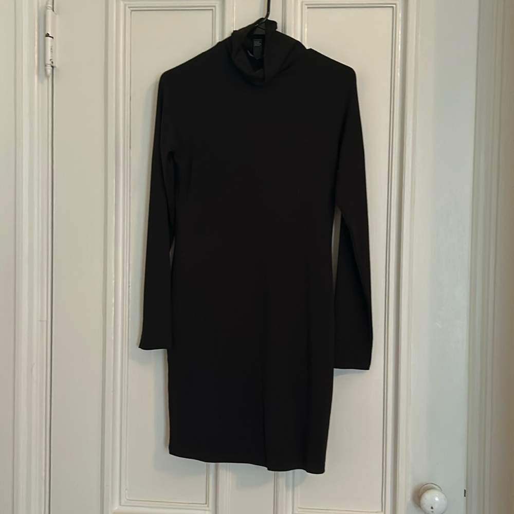 Large sized turtleneck sweater dress with long sleeves